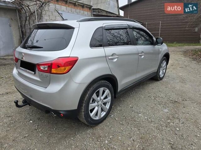 Серый Мицубиси Outlander Sport, объемом двигателя 2 л и пробегом 248 тыс. км за 9999 $, фото 16 на Automoto.ua