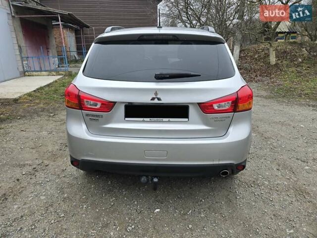 Серый Мицубиси Outlander Sport, объемом двигателя 2 л и пробегом 248 тыс. км за 9999 $, фото 1 на Automoto.ua