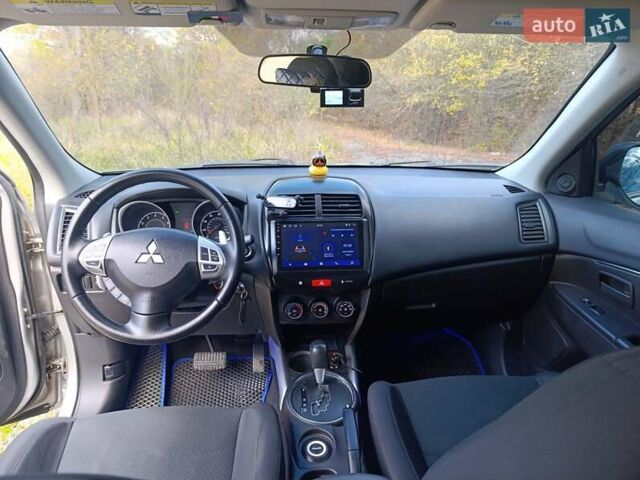 Серый Мицубиси Outlander Sport, объемом двигателя 2 л и пробегом 145 тыс. км за 11200 $, фото 10 на Automoto.ua