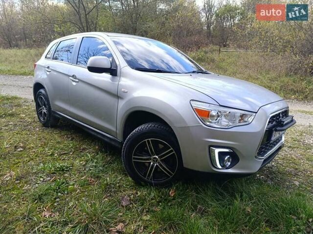 Серый Мицубиси Outlander Sport, объемом двигателя 2 л и пробегом 145 тыс. км за 11200 $, фото 9 на Automoto.ua