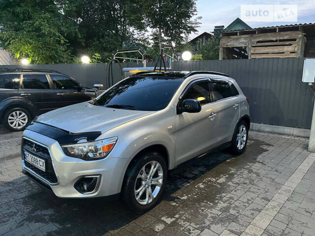 Серый Мицубиси Outlander Sport, объемом двигателя 2 л и пробегом 96 тыс. км за 11000 $, фото 1 на Automoto.ua