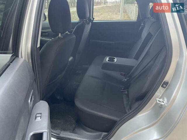 Серый Мицубиси Outlander Sport, объемом двигателя 2 л и пробегом 210 тыс. км за 10000 $, фото 6 на Automoto.ua