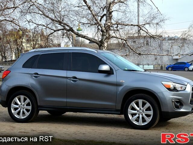 Серый Мицубиси Outlander Sport, объемом двигателя 2 л и пробегом 176 тыс. км за 10400 $, фото 6 на Automoto.ua