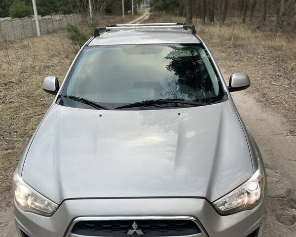 Серый Мицубиси Outlander Sport, объемом двигателя 2 л и пробегом 210 тыс. км за 10000 $, фото 1 на Automoto.ua
