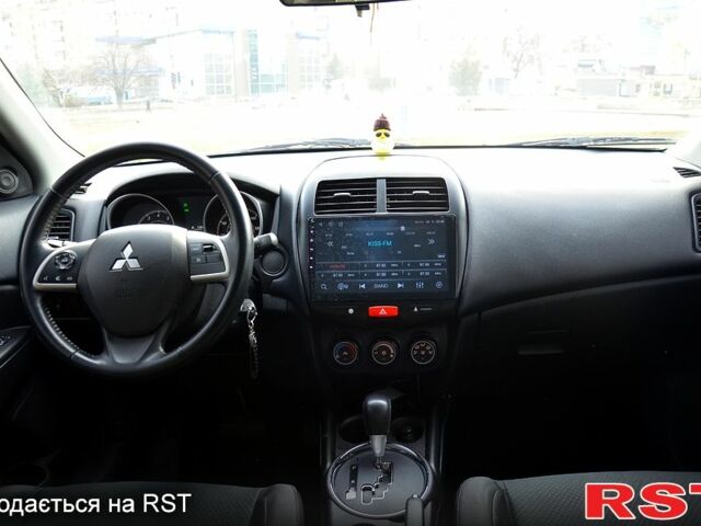 Серый Мицубиси Outlander Sport, объемом двигателя 2 л и пробегом 176 тыс. км за 10400 $, фото 12 на Automoto.ua