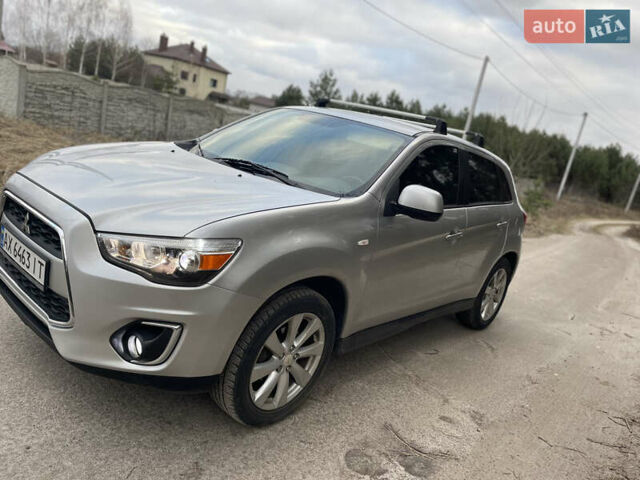 Серый Мицубиси Outlander Sport, объемом двигателя 2 л и пробегом 210 тыс. км за 10000 $, фото 2 на Automoto.ua