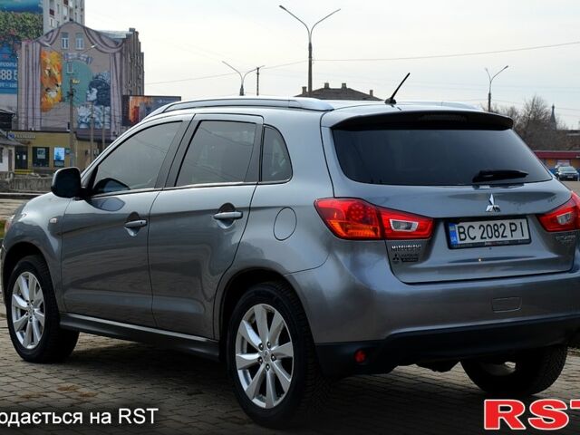 Серый Мицубиси Outlander Sport, объемом двигателя 2 л и пробегом 176 тыс. км за 10400 $, фото 4 на Automoto.ua