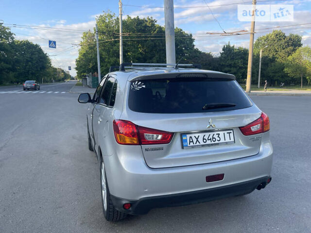 Серый Мицубиси Outlander Sport, объемом двигателя 2 л и пробегом 199 тыс. км за 10000 $, фото 22 на Automoto.ua