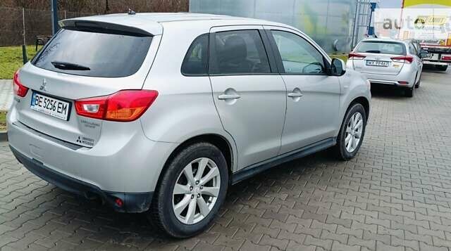 Серый Мицубиси Outlander Sport, объемом двигателя 2 л и пробегом 182 тыс. км за 11000 $, фото 3 на Automoto.ua