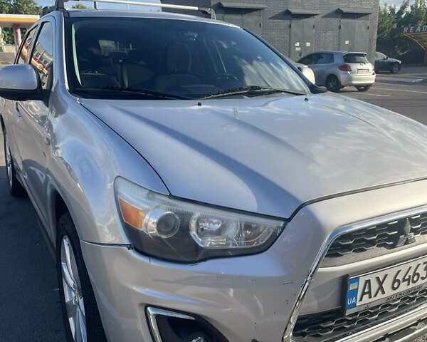 Серый Мицубиси Outlander Sport, объемом двигателя 2 л и пробегом 199 тыс. км за 10000 $, фото 42 на Automoto.ua