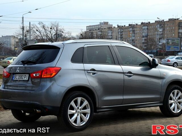 Серый Мицубиси Outlander Sport, объемом двигателя 2 л и пробегом 176 тыс. км за 10400 $, фото 5 на Automoto.ua