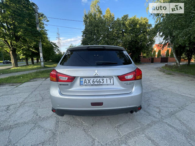 Серый Мицубиси Outlander Sport, объемом двигателя 2 л и пробегом 199 тыс. км за 10000 $, фото 16 на Automoto.ua