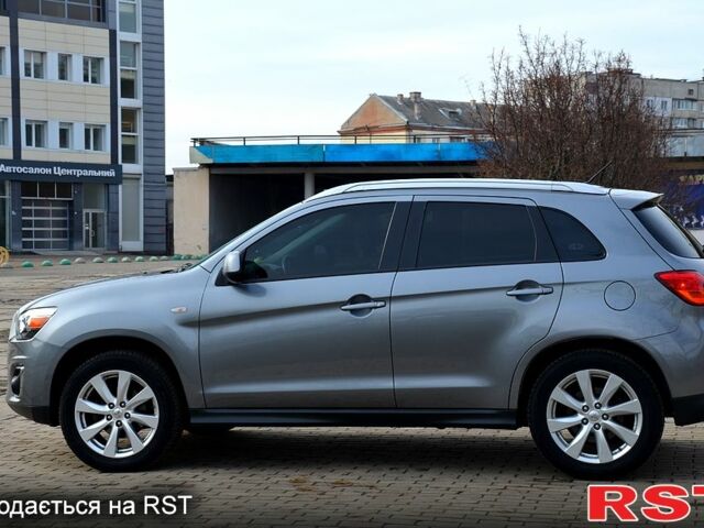 Серый Мицубиси Outlander Sport, объемом двигателя 2 л и пробегом 176 тыс. км за 10400 $, фото 3 на Automoto.ua