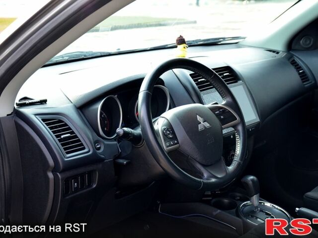 Серый Мицубиси Outlander Sport, объемом двигателя 2 л и пробегом 176 тыс. км за 10400 $, фото 8 на Automoto.ua