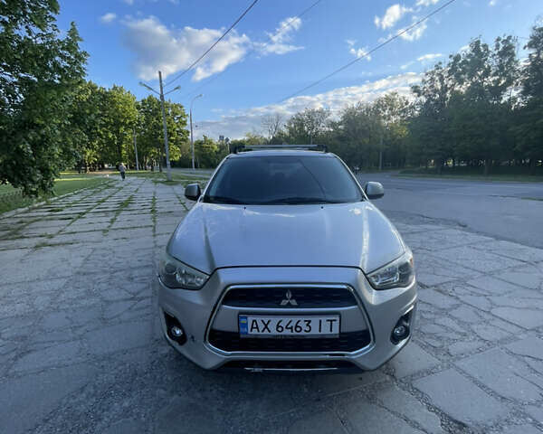 Серый Мицубиси Outlander Sport, объемом двигателя 2 л и пробегом 199 тыс. км за 10000 $, фото 9 на Automoto.ua