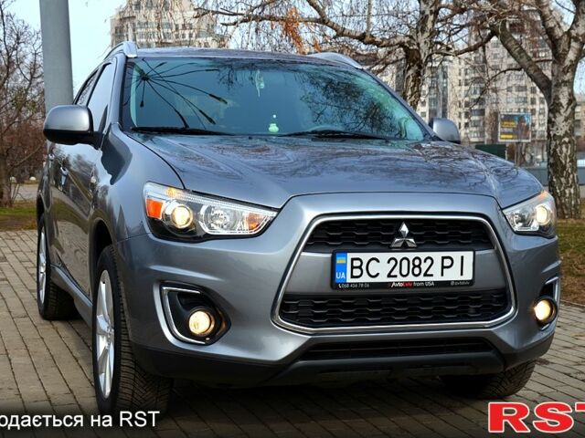 Серый Мицубиси Outlander Sport, объемом двигателя 2 л и пробегом 176 тыс. км за 10400 $, фото 7 на Automoto.ua