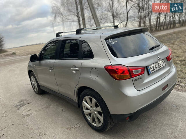 Серый Мицубиси Outlander Sport, объемом двигателя 2 л и пробегом 210 тыс. км за 10000 $, фото 5 на Automoto.ua