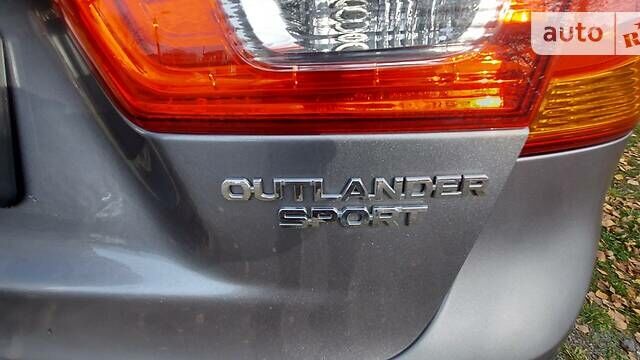 Серый Мицубиси Outlander Sport, объемом двигателя 2 л и пробегом 158 тыс. км за 11850 $, фото 11 на Automoto.ua