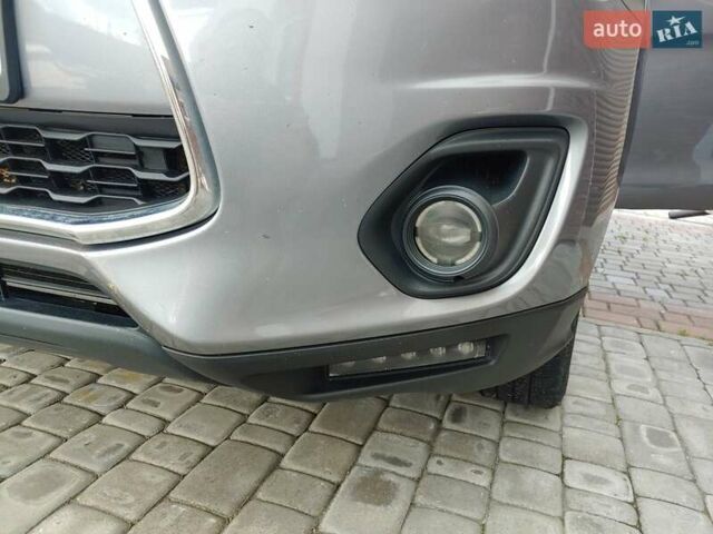 Мицубиси Outlander Sport 2015 в Киеве на Automoto.ua Серый Мицубиси Outlander Sport, объемом двигателя 2.36 л и пробегом 125 тыс. км за 12500 $, фото 11 на Automoto.ua