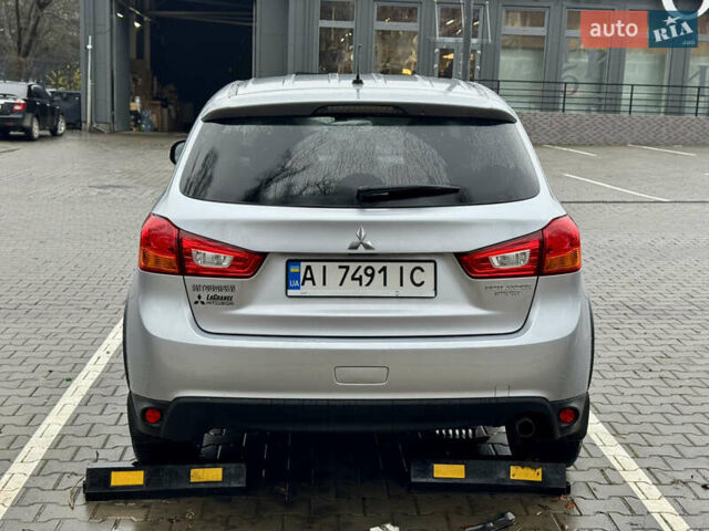 Серый Мицубиси Outlander Sport, объемом двигателя 2 л и пробегом 172 тыс. км за 12700 $, фото 8 на Automoto.ua