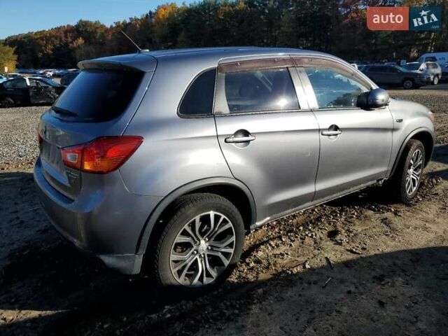Серый Мицубиси Outlander Sport, объемом двигателя 2.4 л и пробегом 172 тыс. км за 1400 $, фото 2 на Automoto.ua