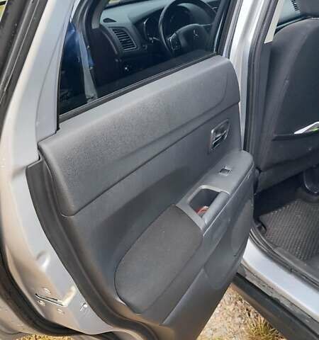 Сірий Міцубісі Outlander Sport, об'ємом двигуна 2.36 л та пробігом 136 тис. км за 13999 $, фото 13 на Automoto.ua