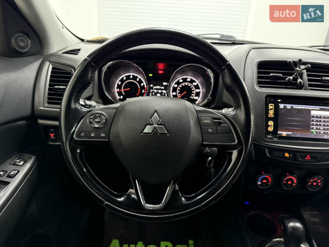 Серый Мицубиси Outlander Sport, объемом двигателя 2 л и пробегом 105 тыс. км за 12900 $, фото 9 на Automoto.ua