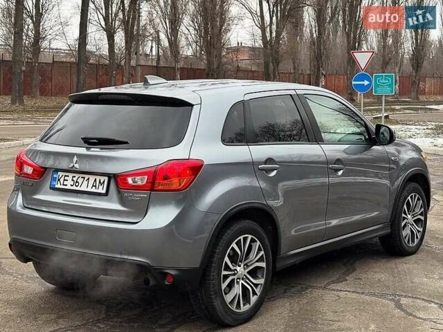 Серый Мицубиси Outlander Sport, объемом двигателя 2 л и пробегом 92 тыс. км за 12400 $, фото 4 на Automoto.ua