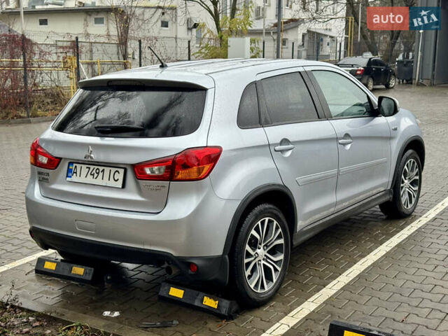 Серый Мицубиси Outlander Sport, объемом двигателя 2 л и пробегом 172 тыс. км за 12700 $, фото 9 на Automoto.ua