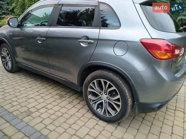 Серый Мицубиси Outlander Sport, объемом двигателя 2 л и пробегом 177 тыс. км за 8950 $, фото 12 на Automoto.ua
