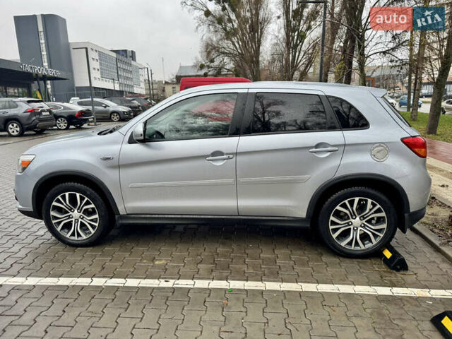 Серый Мицубиси Outlander Sport, объемом двигателя 2 л и пробегом 172 тыс. км за 12700 $, фото 6 на Automoto.ua