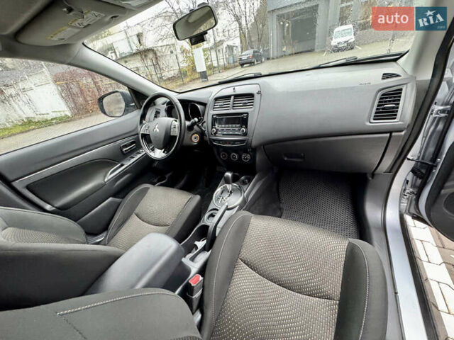 Серый Мицубиси Outlander Sport, объемом двигателя 2 л и пробегом 172 тыс. км за 12700 $, фото 13 на Automoto.ua