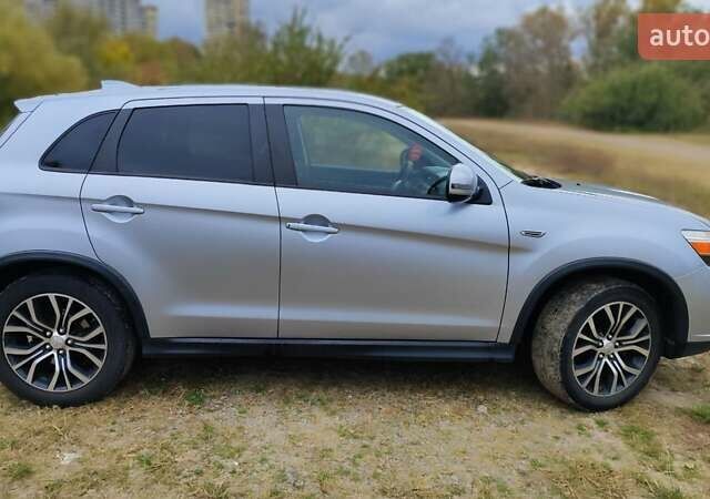Сірий Міцубісі Outlander Sport, об'ємом двигуна 2.36 л та пробігом 136 тис. км за 13999 $, фото 7 на Automoto.ua