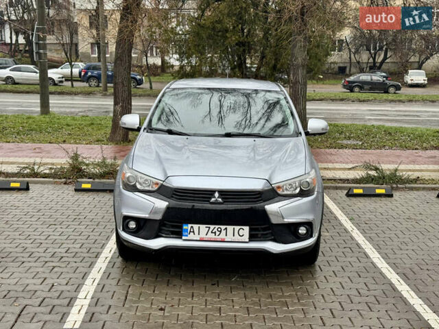 Серый Мицубиси Outlander Sport, объемом двигателя 2 л и пробегом 172 тыс. км за 12700 $, фото 2 на Automoto.ua