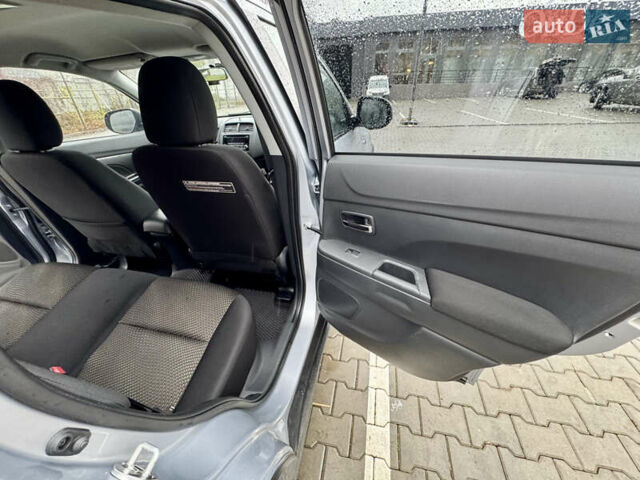 Серый Мицубиси Outlander Sport, объемом двигателя 2 л и пробегом 172 тыс. км за 12700 $, фото 26 на Automoto.ua