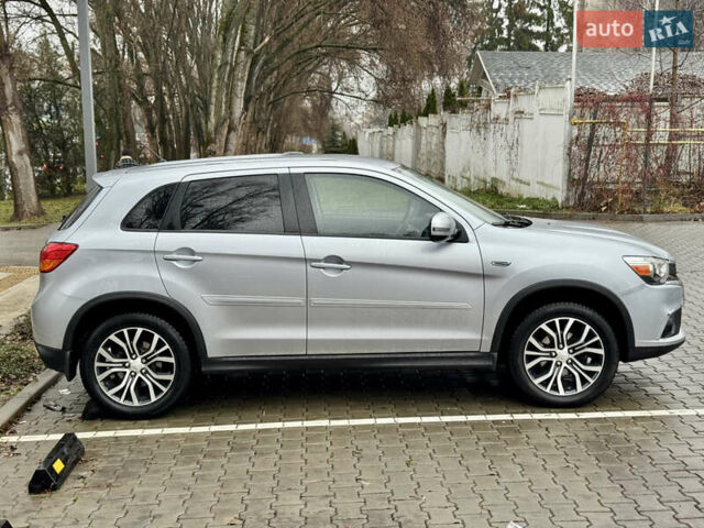 Серый Мицубиси Outlander Sport, объемом двигателя 2 л и пробегом 172 тыс. км за 12700 $, фото 10 на Automoto.ua