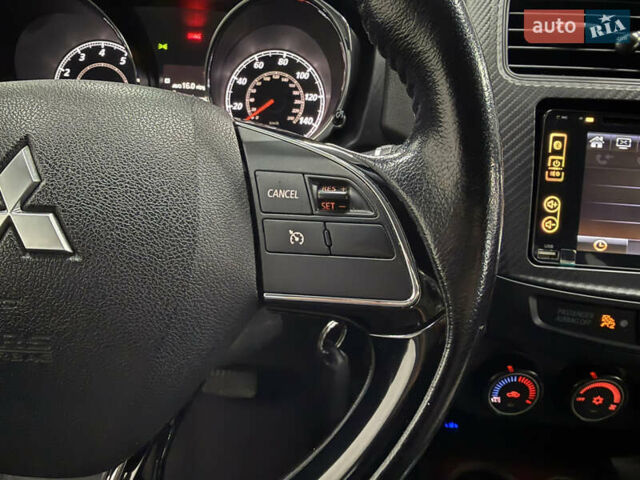 Серый Мицубиси Outlander Sport, объемом двигателя 2 л и пробегом 105 тыс. км за 12900 $, фото 11 на Automoto.ua