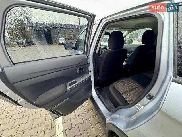 Серый Мицубиси Outlander Sport, объемом двигателя 2 л и пробегом 172 тыс. км за 12700 $, фото 23 на Automoto.ua
