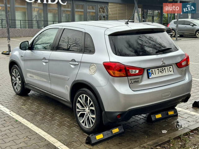 Серый Мицубиси Outlander Sport, объемом двигателя 2 л и пробегом 172 тыс. км за 12700 $, фото 7 на Automoto.ua