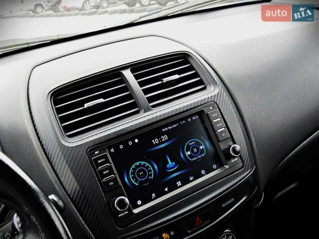 Серый Мицубиси Outlander Sport, объемом двигателя 2 л и пробегом 120 тыс. км за 11700 $, фото 9 на Automoto.ua