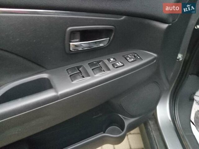 Серый Мицубиси Outlander Sport, объемом двигателя 2 л и пробегом 177 тыс. км за 8950 $, фото 9 на Automoto.ua