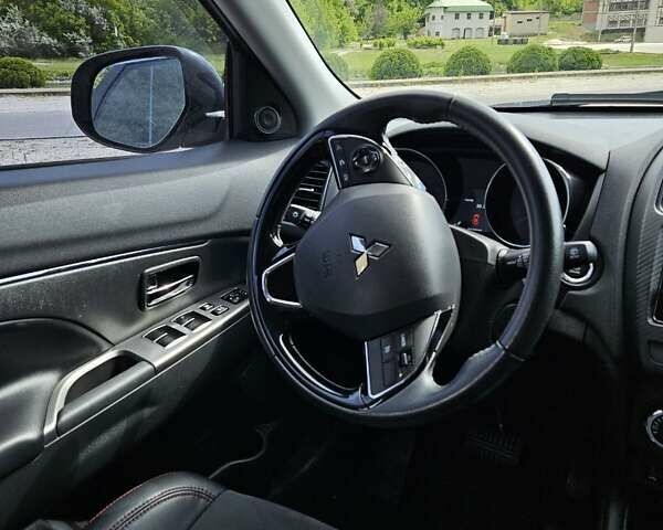 Серый Мицубиси Outlander Sport, объемом двигателя 2.4 л и пробегом 94 тыс. км за 15500 $, фото 18 на Automoto.ua
