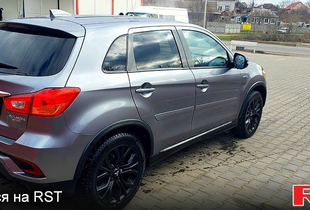 Сірий Міцубісі Outlander Sport, об'ємом двигуна 2 л та пробігом 220 тис. км за 13000 $, фото 6 на Automoto.ua