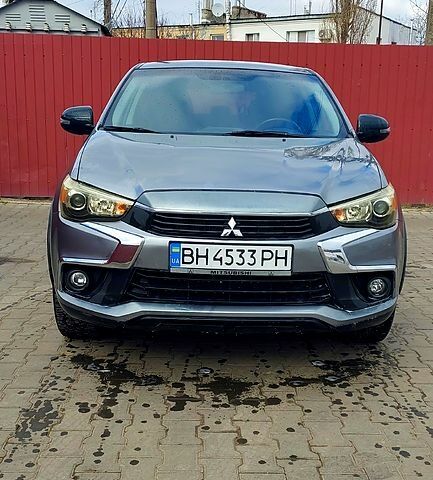 Серый Мицубиси Outlander Sport, объемом двигателя 2 л и пробегом 220 тыс. км за 13000 $, фото 1 на Automoto.ua