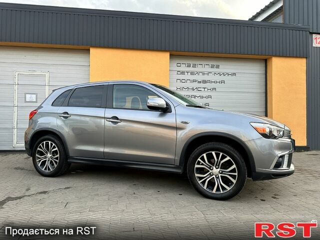 Серый Мицубиси Outlander Sport, объемом двигателя 2.4 л и пробегом 190 тыс. км за 12999 $, фото 10 на Automoto.ua