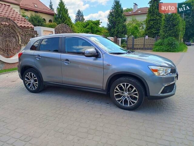 Серый Мицубиси Outlander Sport, объемом двигателя 2 л и пробегом 107 тыс. км за 12200 $, фото 3 на Automoto.ua