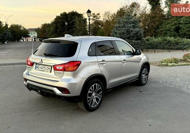 Серый Мицубиси Outlander Sport, объемом двигателя 2 л и пробегом 80 тыс. км за 13599 $, фото 3 на Automoto.ua