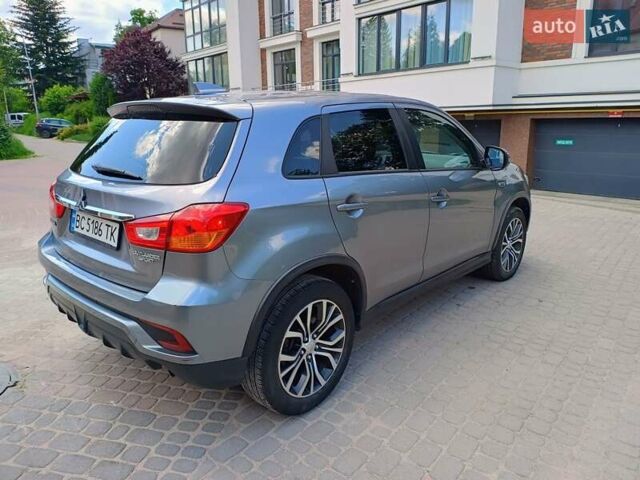 Серый Мицубиси Outlander Sport, объемом двигателя 2 л и пробегом 107 тыс. км за 12200 $, фото 4 на Automoto.ua