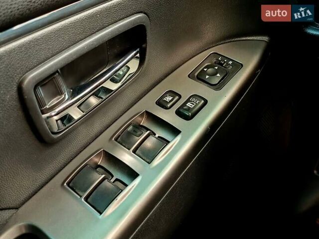 Серый Мицубиси Outlander Sport, объемом двигателя 2 л и пробегом 107 тыс. км за 12200 $, фото 17 на Automoto.ua