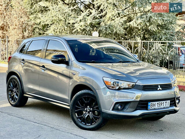 Серый Мицубиси Outlander Sport, объемом двигателя 2 л и пробегом 71 тыс. км за 13900 $, фото 13 на Automoto.ua